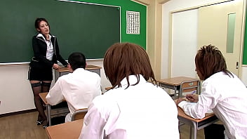 Japanese teacher indulges in oral pleasure with her students before a wild encounter in a hospital setting